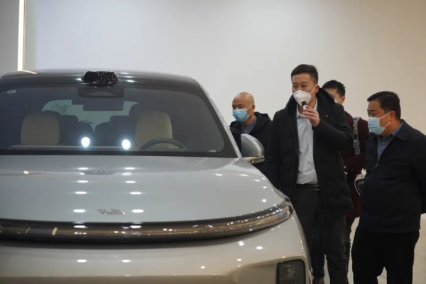 江阳区华阳街道“两委”考察团调研川南新能源汽车城(图3) 微信图片_20221223161804.jpg